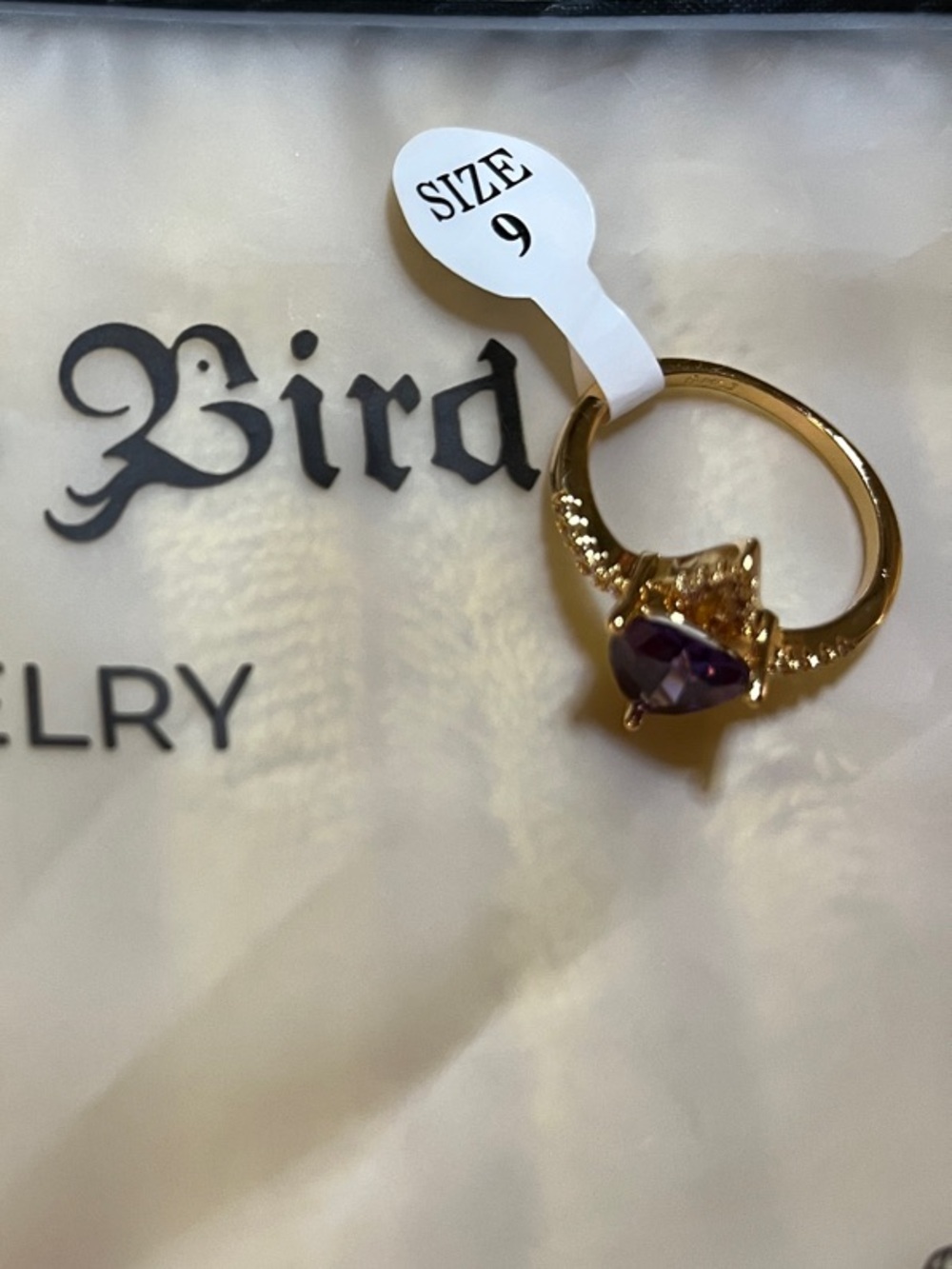 Pretty Bird Gold Ring with Purple Stone